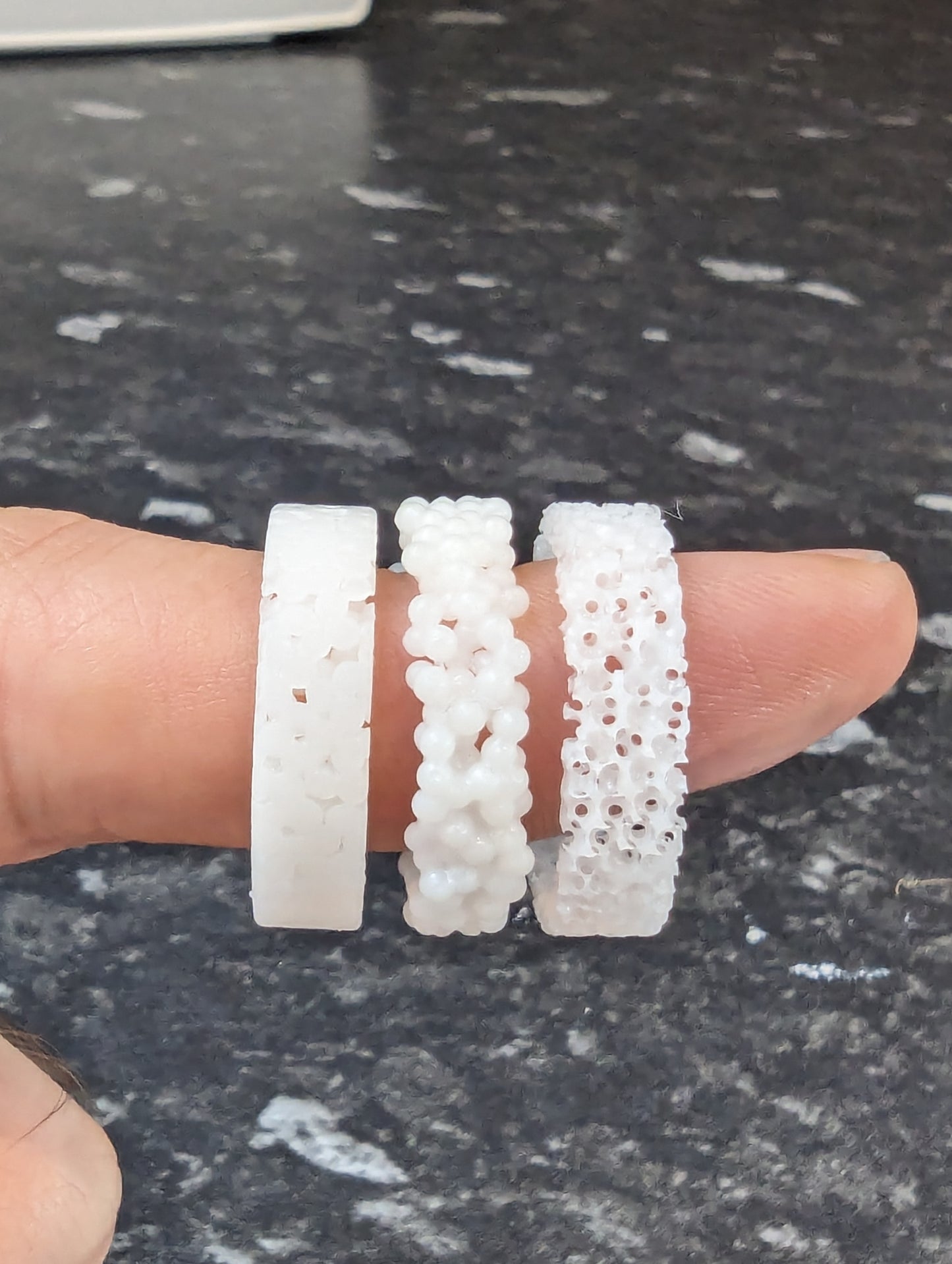 Sphere packing triplet rings