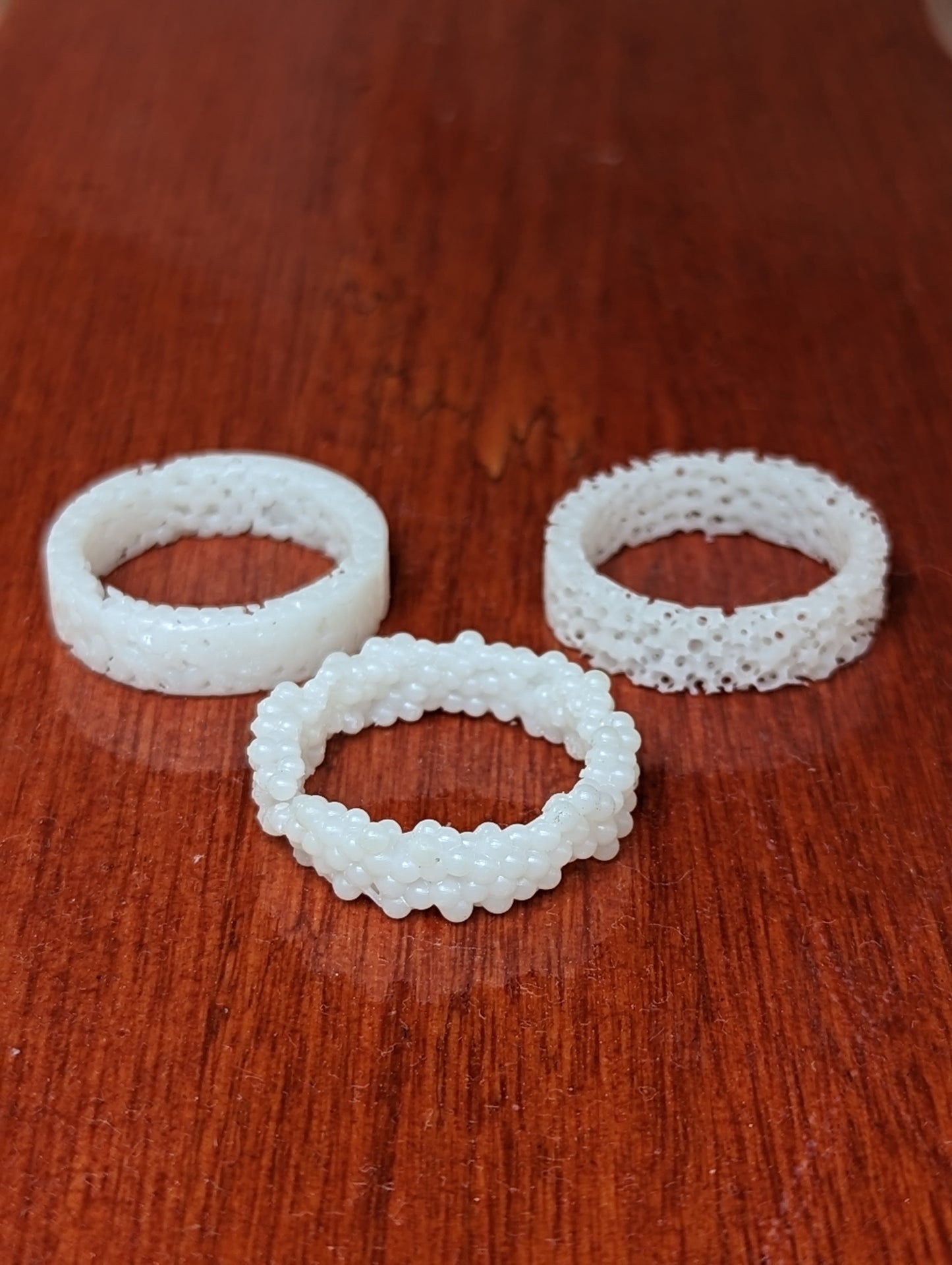 Sphere packing triplet rings